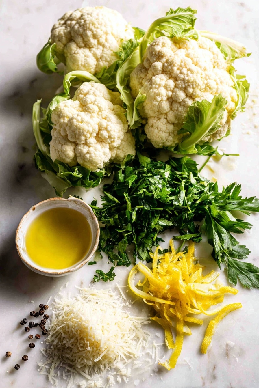 Roasted Cauliflower with Lemon, Parsley, and Parmesan, roasted cauliflower side dish, lemon parmesan cauliflower, easy vegetable side, healthy roasted cauliflower - Flat lay of fresh cauliflower florets with their creamy white curds and light green leaves, bright yellow lemon zest strips, a small bunch of vibrant green chopped parsley leaves, and a small pile of finely grated pale ivory Parmesan cheese, all naturally scattered with a few whole black peppercorns and glistening drops of golden extra-virgin olive oil, placed on white marbled surface, photo taken with an iphone --ar 2:3 --v 7