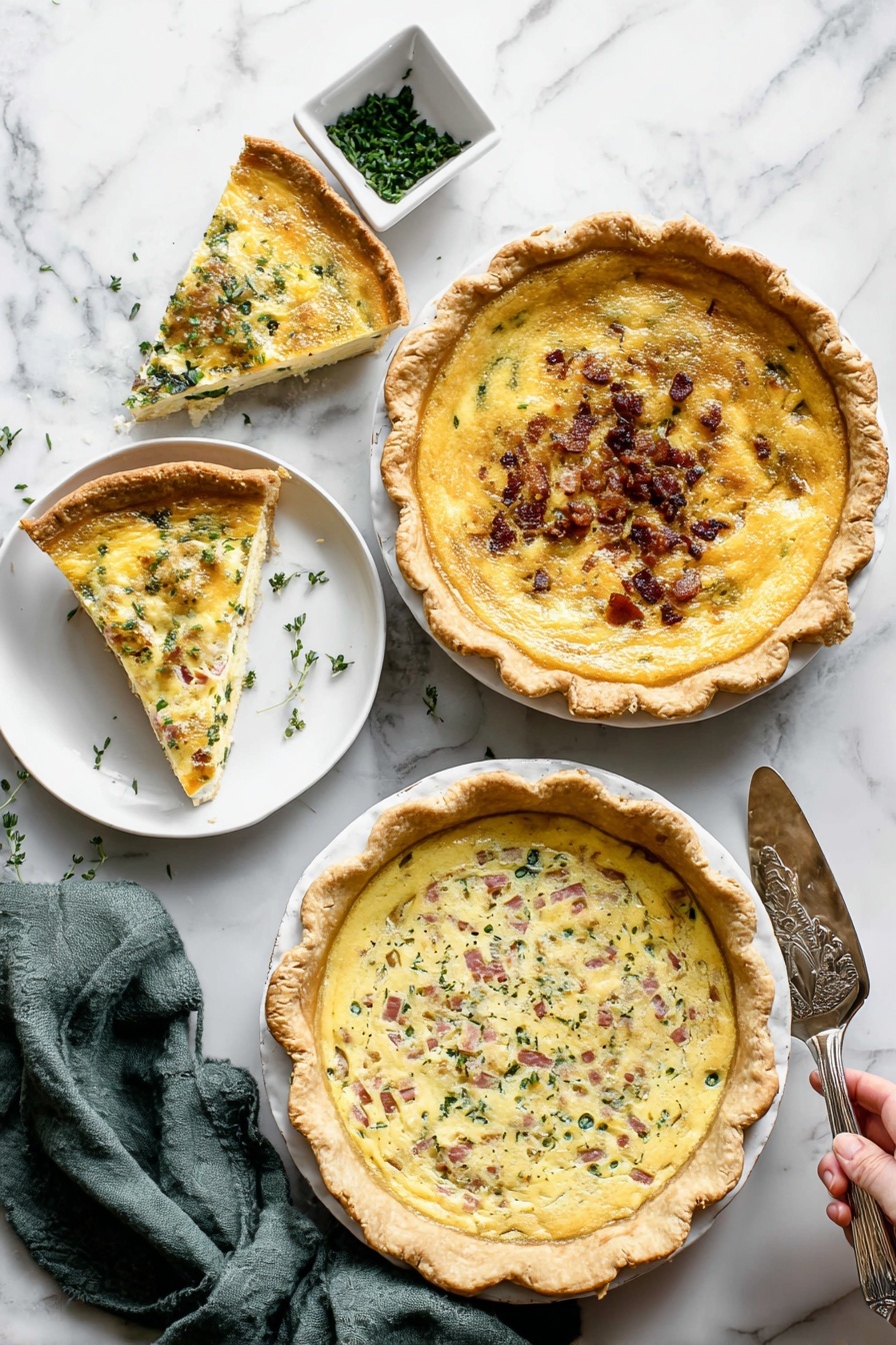 Cheese Quiche, savory brunch dishes, cheesy breakfast recipes, easy quiche recipe, flaky crust quiche - The image shows three quiches on a white marbled surface. The top right quiche has a golden yellow smooth filling with a slightly browned top and a thick golden crust; one slice is missing and placed on a small white plate beside it. The middle left quiche has a creamy yellow filling with small green herbs and bits of browned bacon sprinkled on top, with a thick golden crust. The bottom right quiche has a mixed filling of creamy yellow with green leafy vegetables and pink ham chunks scattered inside, topped with melted cheese and a golden crust. Nearby, a white square dish with chopped green herbs and an olive green cloth napkin are visible. A woman's hand holding a silver serving spatula is resting on the surface near the top right quiche. Photo taken with an iphone --ar 2:3 --v 7