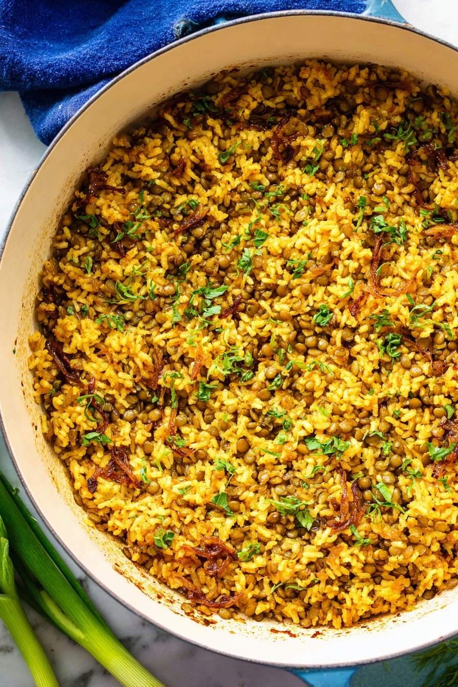 Mujadara Lentils and Rice, Middle Eastern Lentils and Rice, Vegetarian Mujadara, Easy Lentil and Rice Dish, Comforting Plant-Based Meal - The image shows a white round pot filled with a mixed dish made of cooked yellow rice and small green lentils, combined with pieces of light brown caramelized onions and chopped green herbs scattered throughout. The texture looks soft and slightly moist with some grains sticking together and a few small charred spots seen inside the pot. The pot is placed on a white marbled surface with a blue cloth partly visible under its handle, and some green onions lay next to the pot on the lower left side. The lighting highlights the warm golden tones of the rice and the fresh green color of the herbs, creating a vibrant and appetizing look. photo taken with an iphone --ar 2:3 --v 7