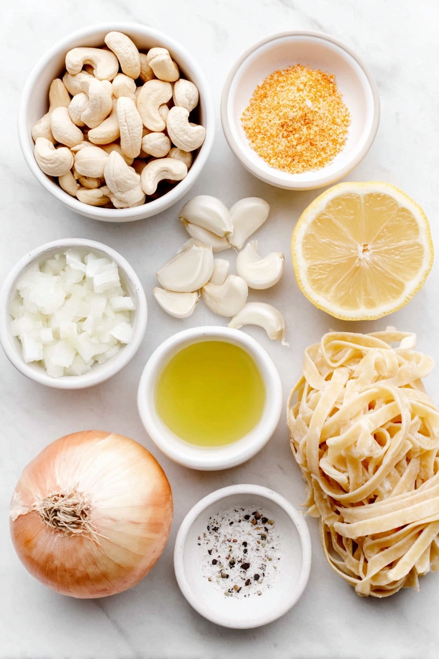 Vegan Cashew Alfredo Sauce, dairy-free Alfredo sauce, plant-based Alfredo recipe, vegan pasta sauce, dairy-free creamy sauce - Flat lay of raw cashews in a small pile, a small white ceramic bowl of olive oil, half a medium sweet onion with some chopped pieces beside it, several peeled garlic cloves scattered naturally, a small white ceramic bowl filled with unsweetened almond milk, a small white ceramic bowl holding golden nutritional yeast flakes, a fresh lemon wedge next to a small white ceramic bowl containing lemon juice, a small white ceramic bowl of coarse salt, and a neatly arranged bundle of uncooked fettuccine pasta strands, all placed on a clean white marble surface, soft natural light, photo taken with an iPhone, professional food photography style, fresh ingredients, white ceramic bowls, no bottles, no duplicates, no utensils, no packaging --ar 2:3 --v 7 --p m7354615311229779997