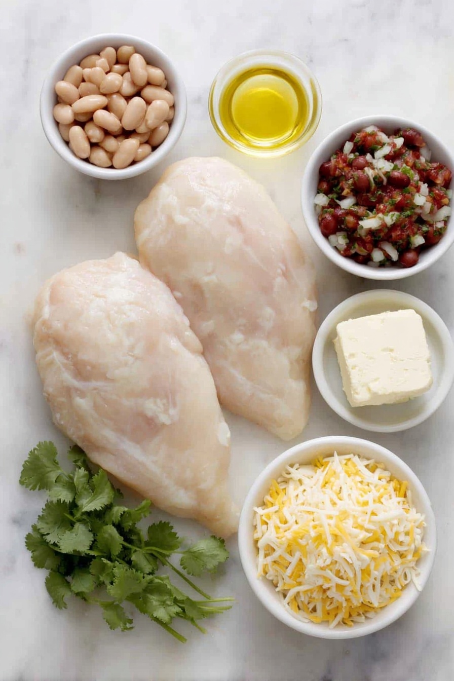 Salsa Chicken Bake, Chicken Bake with Salsa, Easy Salsa Chicken Dinner, Cheesy Salsa Chicken Casserole, Quick Chicken Salsa Recipe - Flat lay of two large raw boneless skinless chicken breasts, a small white bowl of orange-red taco seasoning powder, a small white bowl of golden olive oil, a block of creamy white cream cheese, a small white bowl filled with smooth light brown refried beans, a small white bowl of chunky red salsa with visible tomato and herbs, a small white bowl with shredded pale yellow cheddar cheese, a small white bowl with shredded white Monterey Jack cheese, and a few fresh bright green cilantro sprigs arranged neatly — all placed on a clean white marble surface, soft natural light, photo taken with an iPhone, professional food photography style, fresh ingredients, white ceramic bowls, no bottles, no duplicates, no utensils, no packaging --ar 2:3 --v 7 --p m7354615311229779997