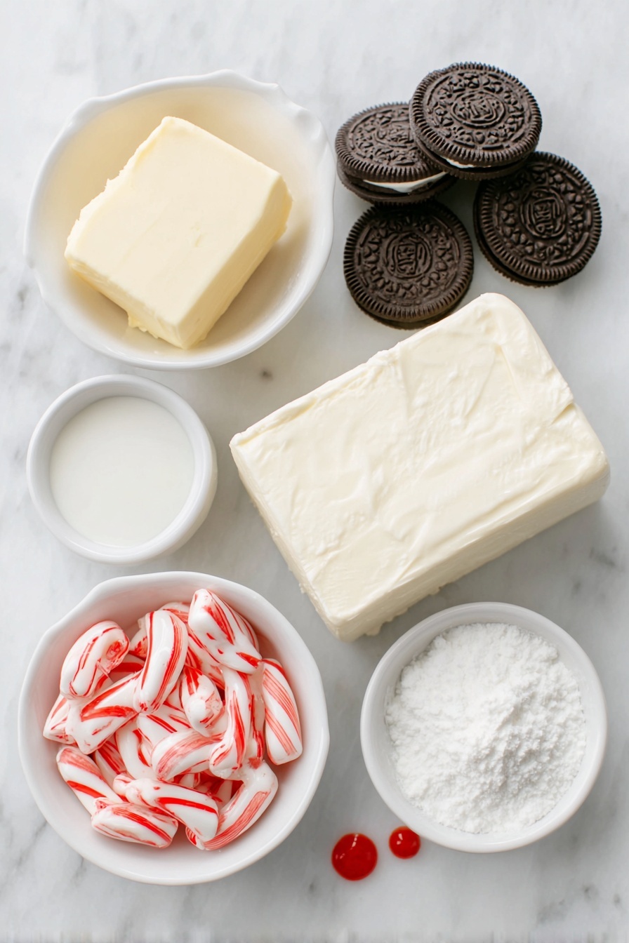 No-Bake Peppermint Kisses Pie, peppermint kisses pie, festive no-bake dessert, holiday peppermint pie, simple mint pie recipe - Flat lay of a small pile of whole Oreos with visible cream filling, a handful of individually unwrapped red and white peppermint candy cane kisses, a small white ceramic bowl with melted unsalted butter, a block of full-fat cream cheese with smooth edges, a small white bowl filled with powdered sugar, a small white bowl of heavy cream, another small white bowl holding a clear vanilla extract liquid, a small white bowl with peppermint extract liquid, two small drops of vivid red food coloring on the white surface, all arranged symmetrically and proportionally in balance, placed on a clean white marble surface, soft natural light, photo taken with an iPhone, professional food photography style, fresh ingredients, white ceramic bowls, no bottles, no duplicates, no utensils, no packaging --ar 2:3 --v 7 --p m7354615311229779997
