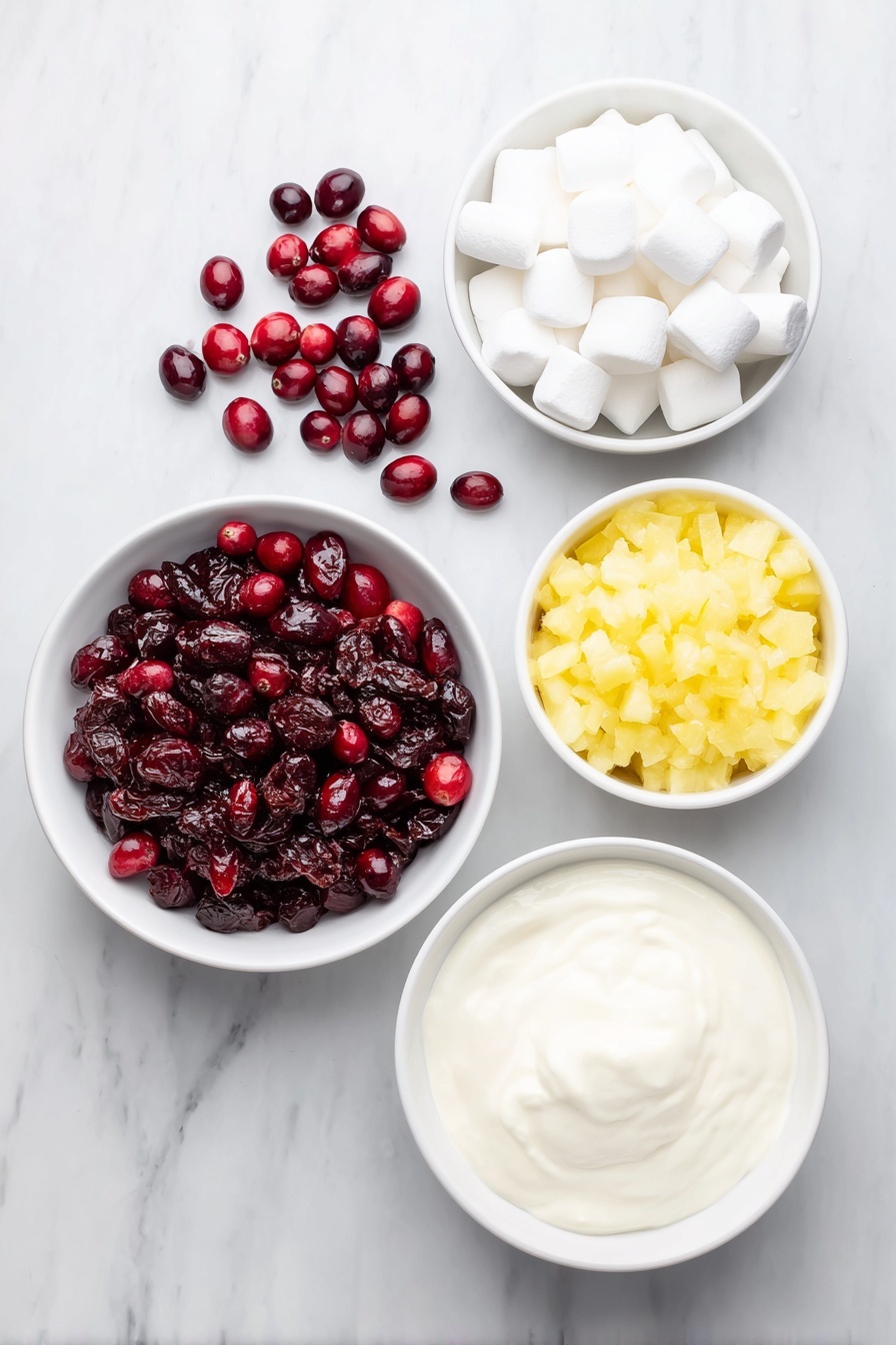 Cranberry Fluff Salad, holiday side recipes, festive Christmas salads, easy cranberry salad, creamy fruit salad - Flat lay of fresh whole cranberries scattered in a small pile, a small white ceramic bowl filled with granulated sugar, a small white ceramic bowl holding bright yellow crushed pineapple pieces, a small pile of soft white mini-marshmallows, and a small white ceramic bowl of thick heavy cream placed alongside, all arranged symmetrically on a clean white marble surface, soft natural light, photo taken with an iPhone, professional food photography style, fresh ingredients, white ceramic bowls, no bottles, no duplicates, no utensils, no packaging --ar 2:3 --v 7 --p m7354615311229779997