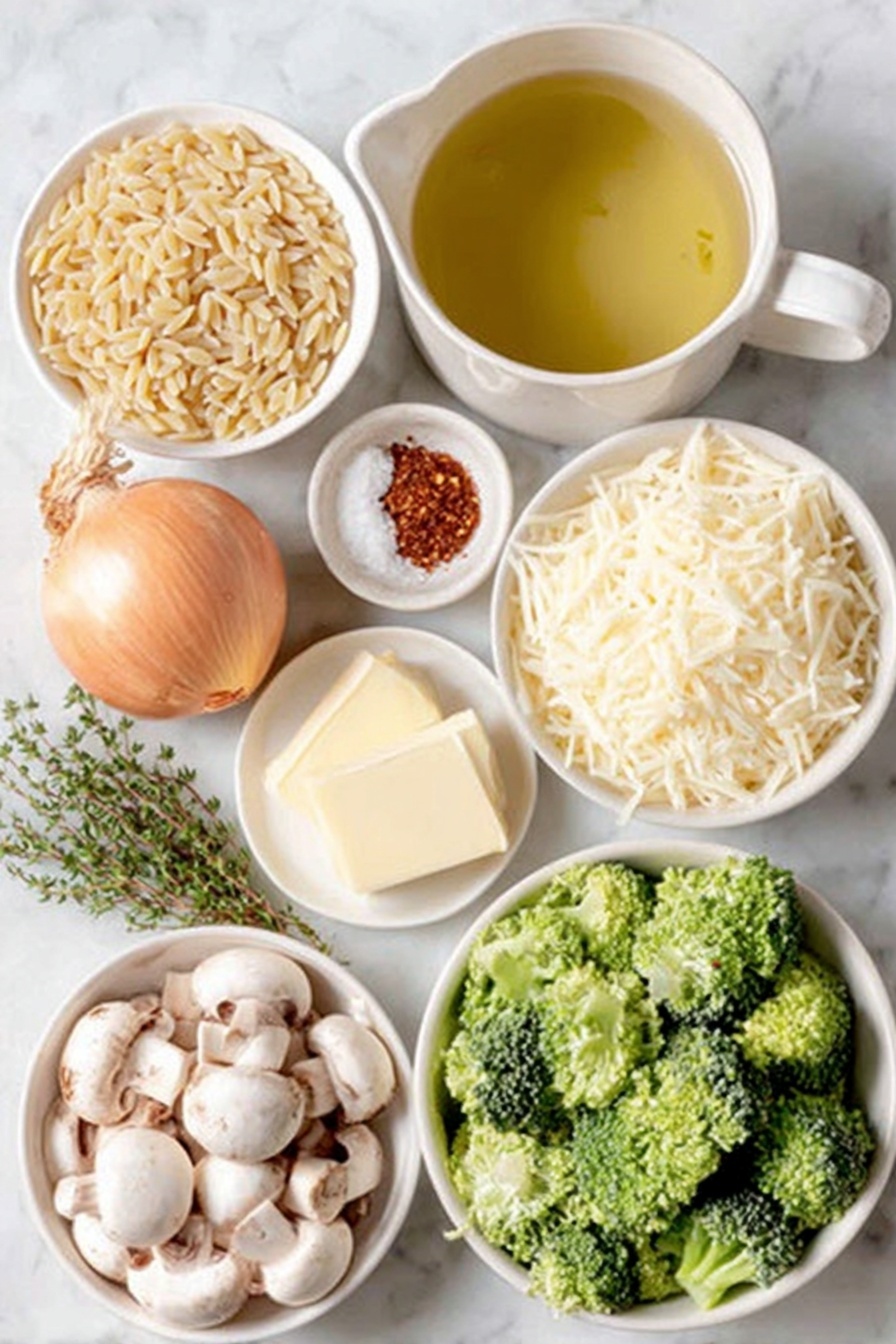 Cheesy Broccoli Orzo Bake, cheesy broccoli pasta bake, creamy orzo casserole, easy broccoli pasta recipe, one skillet pasta with cheese - Flat lay of a small white ceramic bowl of extra virgin olive oil, a whole yellow onion peeled with top and root ends visible, a small white ceramic bowl filled with roughly chopped fresh white mushrooms, two tablespoons of salted butter on a simple white ceramic dish, a small mound of dry orzo pasta scattered neatly, a small white ceramic bowl with fresh green thyme leaves, a small white ceramic bowl of clear vegetable broth, a small white ceramic bowl holding dry white wine, a heap of bright green broccoli florets, a fresh glossy bay leaf, a small white ceramic bowl with a fine white powder of garlic powder, a small white ceramic bowl with vibrant red cayenne pepper powder, half a lemon with fresh zest visible, a small white ceramic bowl of whole milk, a small white ceramic bowl with shredded sharp cheddar cheese, a small white ceramic bowl with grated asiago cheese, a few sprigs of fresh basil, all arranged with perfect symmetry and balanced proportions, placed on a clean white marble surface, soft natural light, photo taken with an iPhone, professional food photography style, fresh ingredients, white ceramic bowls, no bottles, no duplicates, no utensils, no packaging --ar 2:3 --v 7 --p m7354615311229779997